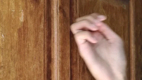 Right Hand Knocks on The Wooden Door Stock Footage 292937258