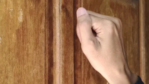 Right Hand Knocks on The Wooden Door of The House Stock Footage 292937265