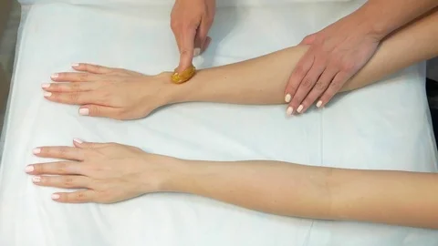 Right hand Sugaring Stock Footage 73383028