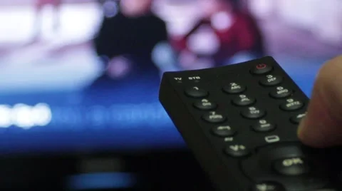 Right hand Switching The Tv Set Channels Stock Footage 40645455