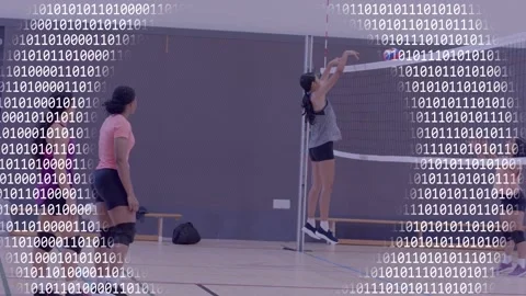 Right handler tossing ball, grey-top jumper blocking in sports drill while Stock Footage 333318517