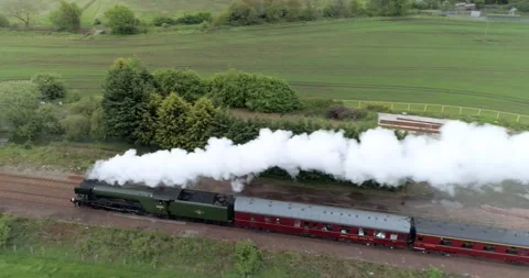 Right to left aerial tracking shot of the Flying Scotsman Steam train Video stock 169062315