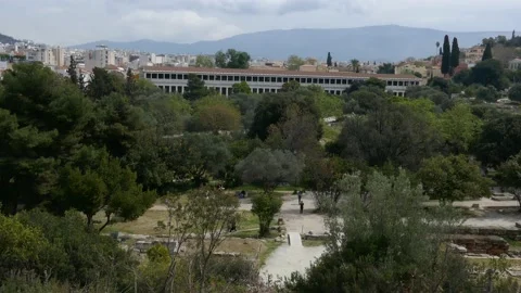 Right to left pan from Acropolis to the Stoa of Attalos and the city of Athens Stock Footage 130193884