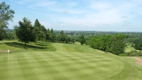 Right to left pan across a golf putting green Stock Footage 288011811