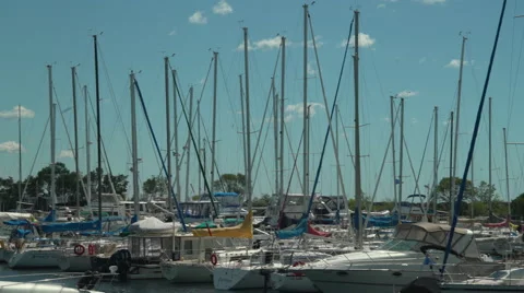 Right to Left pan across a sea of sailboat masts. Stock Footage 64494046