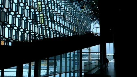 Right to left pan in interior view of Harpa concert hall and conference centre Stock Footage 93219364