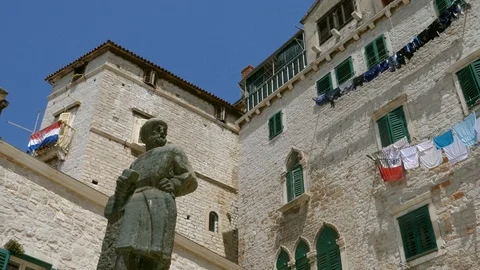 Right to left pan over old town houses in historical city of Sinbenik in Croatia Stock Footage 90268478