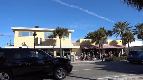 Right To Left Pan People At Beach Resort Walking On Street Visiting Shops Stock Footage 127374792