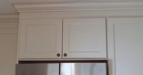 Right to left pan showing moulding detail of newly modernized kitchen. Stock Footage 138912229