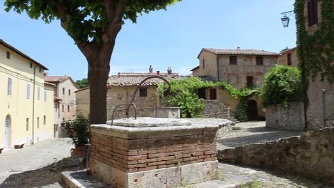 Right left pan view of a beautiful italian square in Rocca D'Orcia Stock Footage 80154175