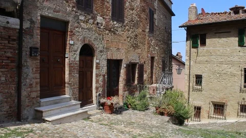 Right-Left pan view of the Square Vecchietta in Castiglione D'Orcia, Tuscany Stock Footage 99654132