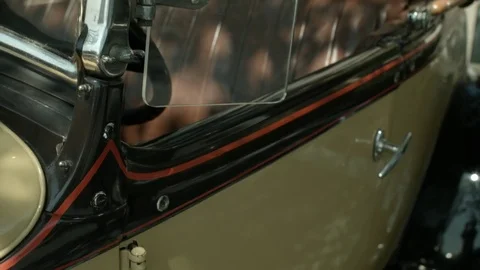 Right to Left Panning Shot of Windshield of a Classic Convertible Car   Stock Footage 79606370