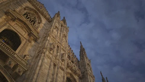 Right to left real time medium shot of a Milan Cathedral. A popular tourist Stock-Footage 122288768