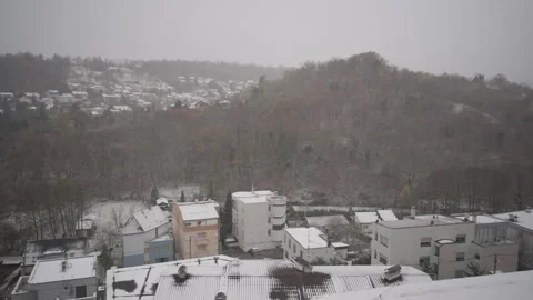 Right to Left Rooftop Pan of Snowy Mlinovi Neighborhood, Zagreb Stock Footage 321619135
