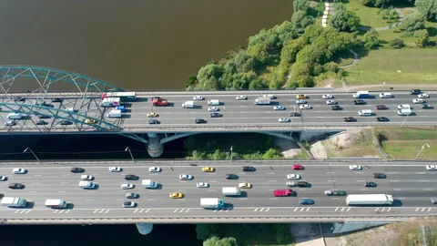 From right to left tracking motion on traffic on bridge with two roads. Stock Footage 140817709