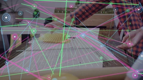 Right man reaching ruler partner smoothing sheet aligning domes for design HUD Stockbeeldmateriaal 333950144