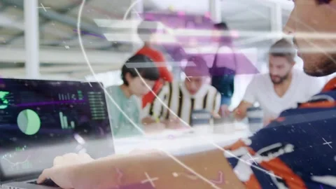 Right man using laptop moving mouse and initiating motion chart overlays across Stock Footage 333575205