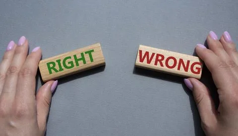 Right or Wrong symbol. Concept word Right or Wrong on wooden blocks. Busine.. Stock Photos