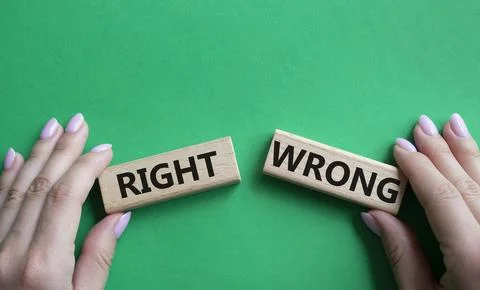 Right or Wrong symbol. Concept word Right or Wrong on wooden blocks. Busine.. Stock Photos