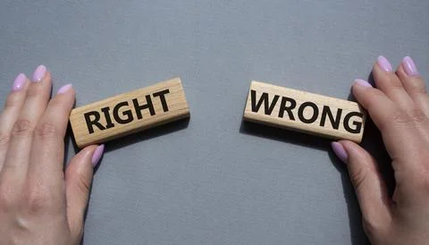 Right or Wrong symbol. Concept word Right or Wrong on wooden blocks. Busine.. Stock Photos