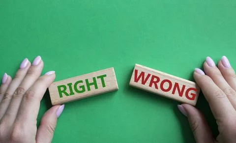 Right or Wrong symbol. Concept word Right or Wrong on wooden blocks. Business Stock Photos