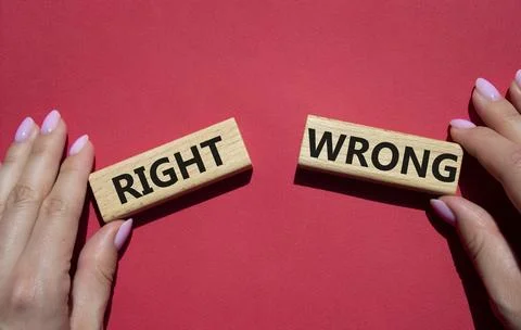 Right or Wrong symbol. Concept word Right or Wrong on wooden blocks. Busine.. Stock Photos