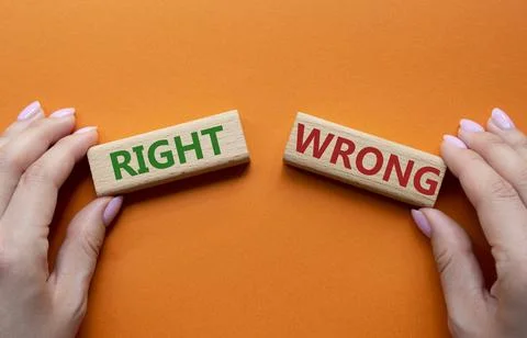 Right or Wrong symbol. Concept word Right or Wrong on wooden blocks. Busine.. Stock Photos