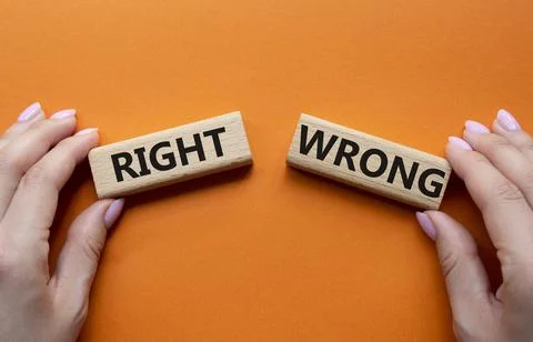 Right or Wrong symbol. Concept word Right or Wrong on wooden blocks. Busine.. Stock Photos