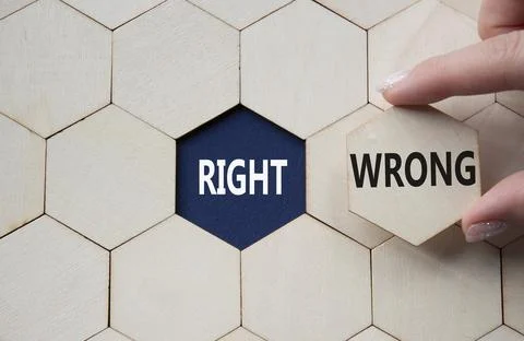 Right or Wrong symbol. Concept word Right or Wrong on wooden comb puzzle. B.. Stock Photos