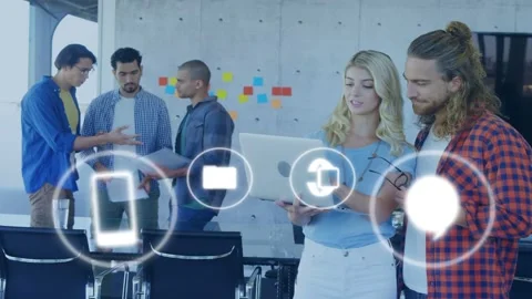 Right pair typing laptop and viewing phone starting tech UI icons moving over Vídeo Stock 334788690