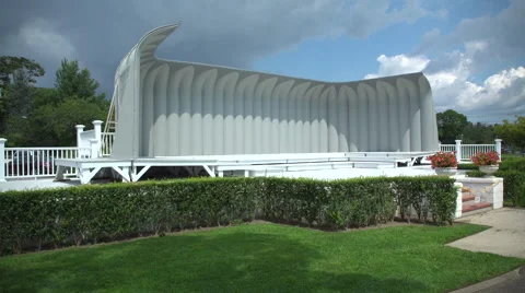 Right pan to a band shell in a park Stock Footage 67383523
