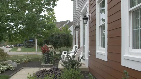 Right Pan of Front of Red House From Side Angle 스톡 동영상 100899401