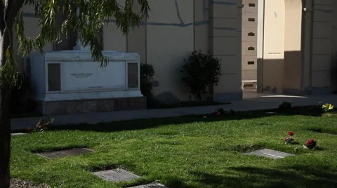 Right pan over graves and columbarium at Forest Lawn Memorial Park Stock Footage 59334836