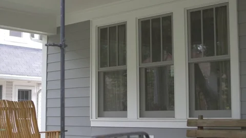 Right Pan of Porch Windows Stock Footage 100899427