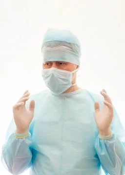 Right positioned hands of ready to work surgeon in sterile gown, mask and gloves Stock-Fotos