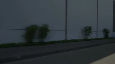 Right Rear Three Quarter view of a Driving Plate: Car travels on NW Front Avenue Stock Footage 59311447