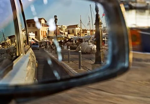 Right side mirror in the car on the dock Stock Photos