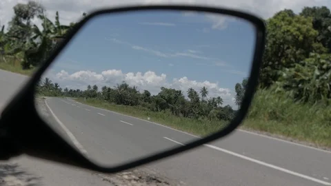 Right side rearview mirror view of the interprovince road Stock Footage 121651040