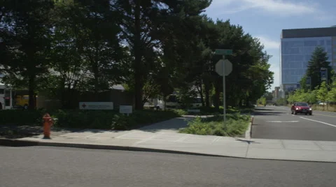 Right Side view of a Driving Plate: Car turns left out of Legacy Emanuel Stock Footage 59308892