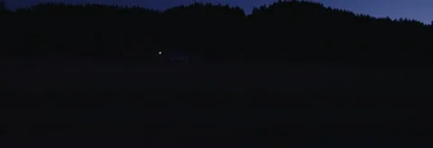 Right Side view of a Driving Plate: Car travels at dusk along Melqua Road Vidéo 59330880