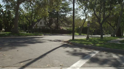 Right Side view of a Driving Plate: Car turns left from South Oak Knoll Avenue Stock Footage 59334145