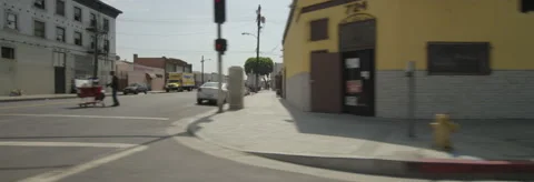 Right Side view of a Driving Plate: Car travels on 7th Street in Los Angeles Stock Footage 59360642