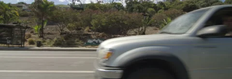 Right Side view of a Driving Plate: Car traveling on Temescal Canyon Road in Stock Footage 59496652
