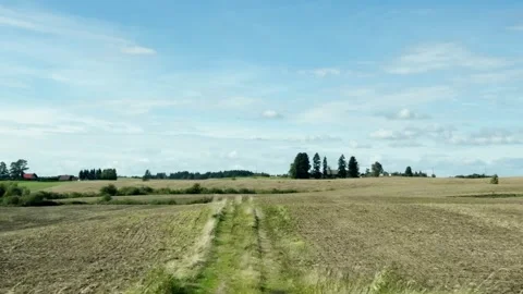 Right side view driving plate of agriculture fields with roadside posts, scenic Stock Footage 345844406