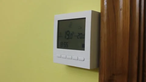 Right side view of a heating thermostat Stock Footage 322026881
