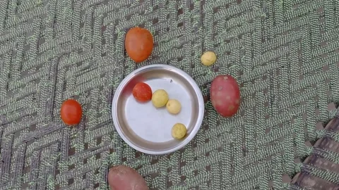 Right Side View Vegetables on Plate on Woven Bed Stockbeeldmateriaal 347924995