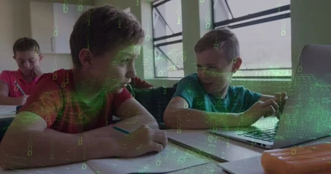 Right student tapping laptop, left peer glancing up then joining, green overlay Stock Footage 331227342