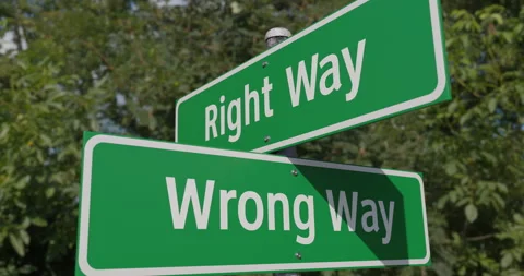 Right Way, Wrong Way 2 Way Green Road Sign Along The Road. Stock Footage 268492399