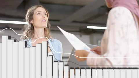 Right woman presenting papers left woman speaking during business review 3D bars Stock Footage 333132623