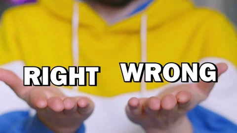 RIGHT WRONG Choice Text Appearing on Male Hands and Tracking with Up and Down Stock Footage 306583978